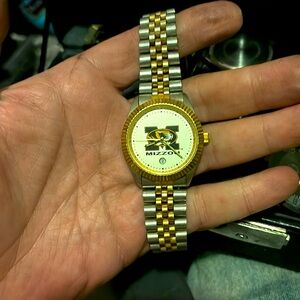 Men’s Mizzou watch. Silver gold band